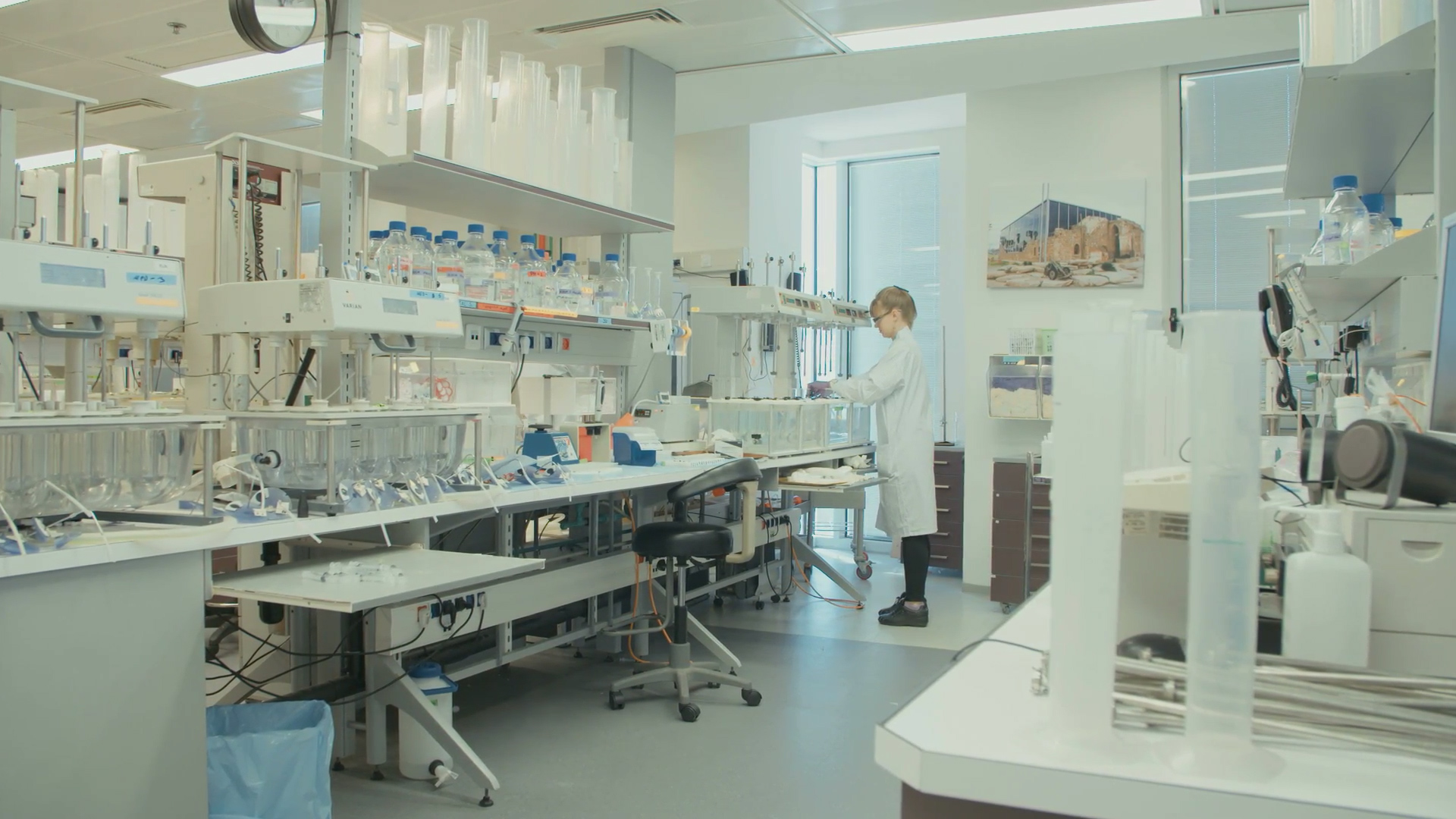 Scientist working in a modern laboratory representing build-to-suit dedicated facilities